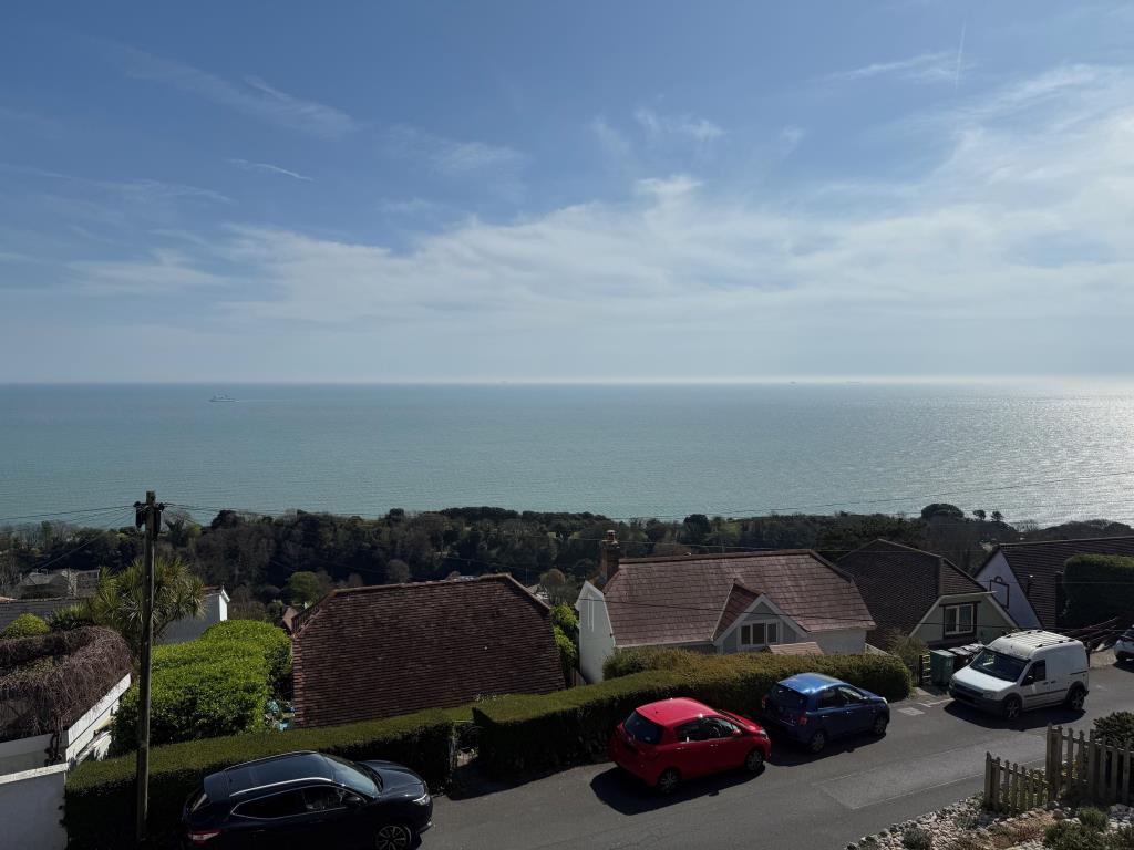 Lot: 163 - FOUR-BEDROOM HOUSE FOR IMPROVEMENT WITH STUNNING SEA VIEWS AND REAR VEHICULAR ACCESS - A View from the front of the house